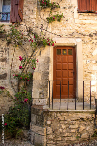 a door in a stone building in Viviers. Viviers is a commune in the department of Ardèche in southern France. It is a small walled city situated on the bank of the Rhône River.