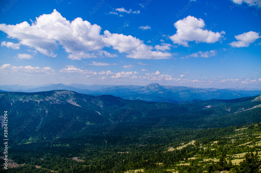 Fototapeta premium View from high mountain. clouds in the sky