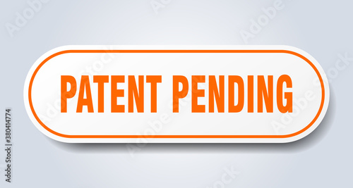 patent pending sign. rounded isolated button. white sticker