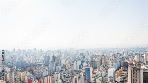 Urban aerial panorama of São Paulo in a sunny day with blue sky. View from Copan building.