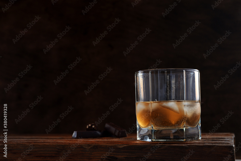 cold alcoholic drink in a glass stock on wooden table cold alcoholic drink in a glass stock on wooden table