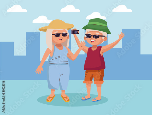 old couple tourist with camera photographic on the city active seniors