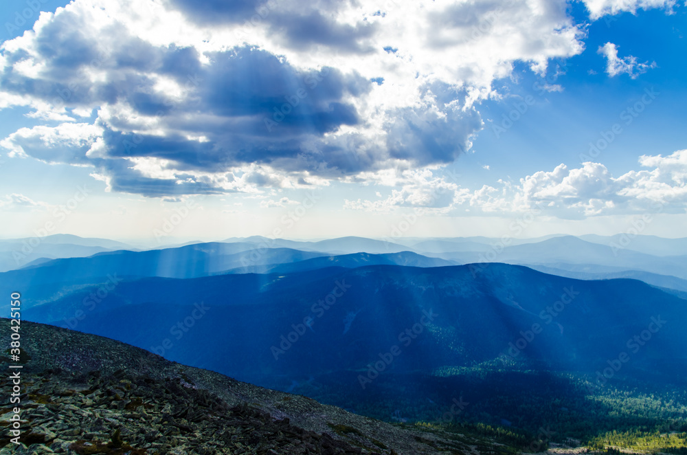 Obraz premium View from high mountain. clouds in the sky