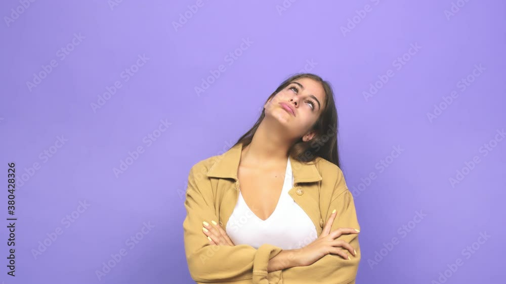 Young caucasian woman tired of a repetitive task Young caucasian woman tired of a repetitive task
