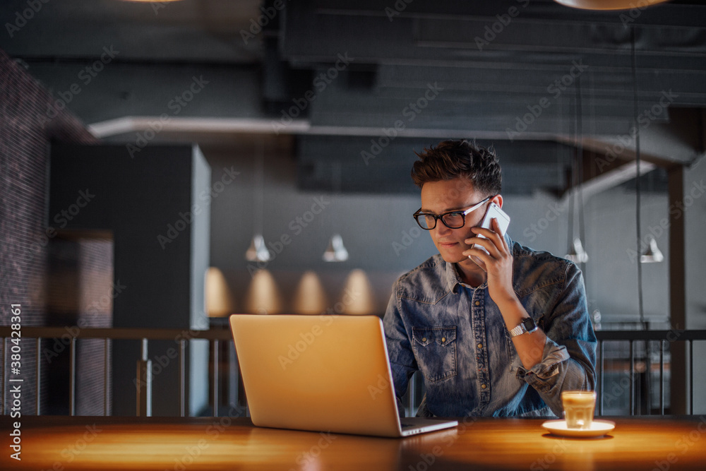 Man working on computer.