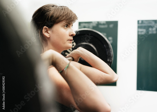 Female Weightlifter In Gym photo