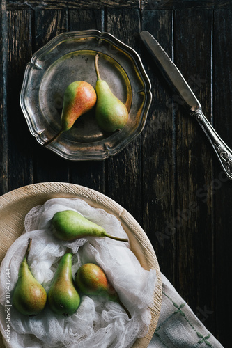 Pears on Dark Wooden Table