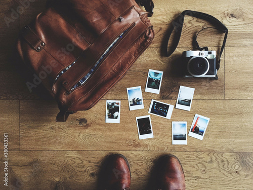 Instant Pictures , Leather Man Bag and Vintage Camera photo