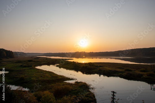 A beautiful picture of the river on the autumn evening. Sunset  landscape photography