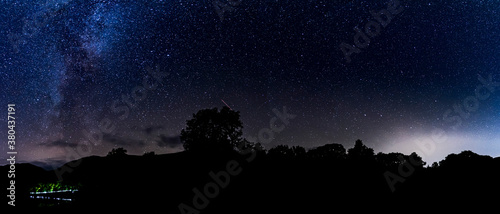 A panoramic view of the milky way & the plough over the hills of Ullswater photo