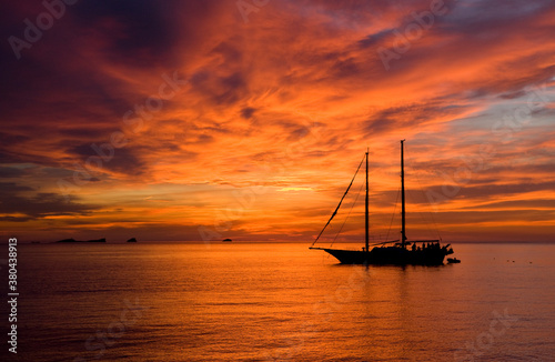 boat at sunset photo