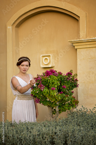 Girl in Greek style dress.