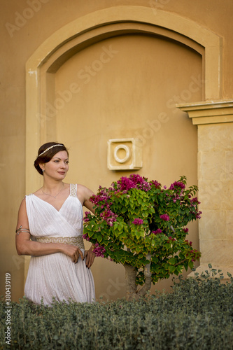 Girl in Greek style dress.