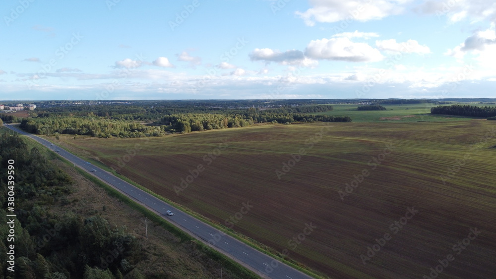 Top view of an asphalt road in the fields Top view of an asphalt road in the fields