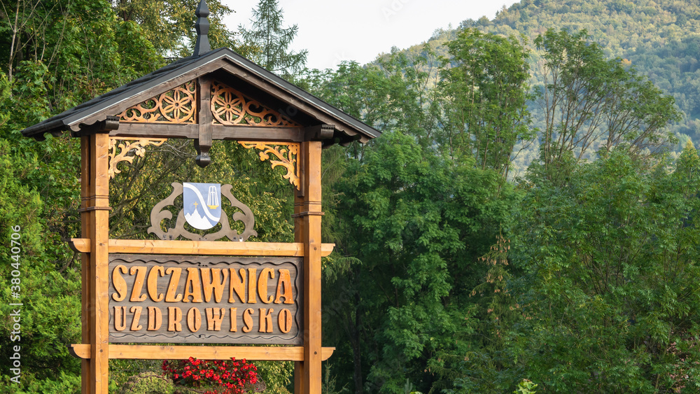 SZCZAWNICA, POLAND - SEP 12, 2020: Sign marking entrance to Szczawnica village on sunny day during autumn season. This place is a well-known resort town famous for its favorable climatic conditions.