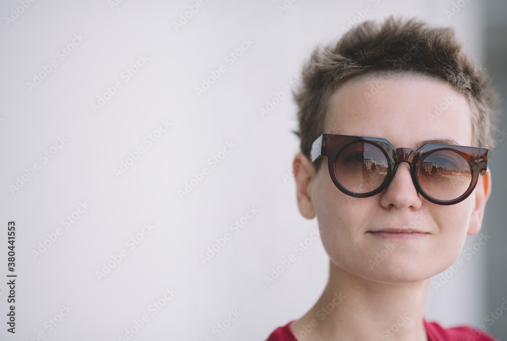 portrait of real young woman with sunglasses portrait of real young woman with sunglasses