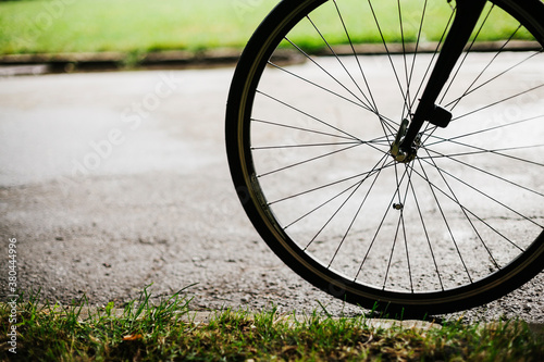 Detail shot of ciclyst and his bike photo