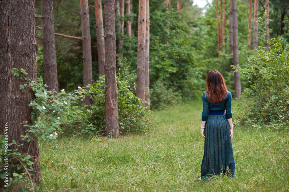 The girl in a dark cyan dress The girl in a dark cyan dress