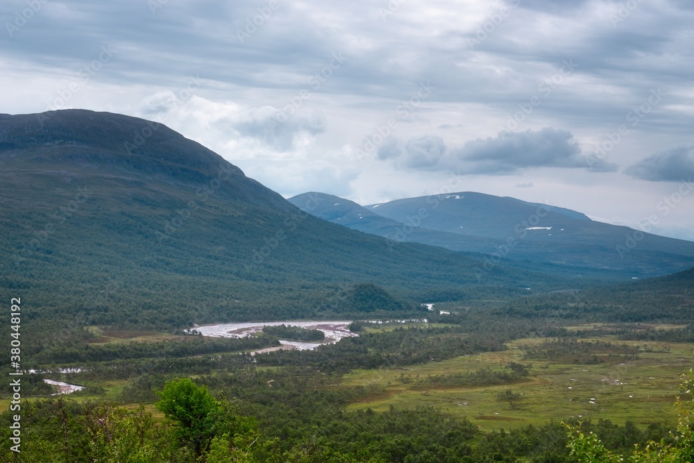 Storulvån (Sweden). View of the mountains and the green valley.