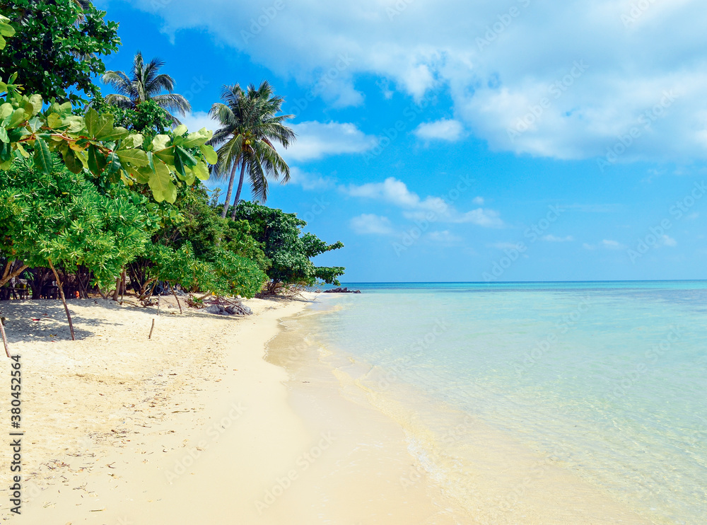Crystal clear turquoise waters surrounding perfect postcard tropical getaway island Crystal clear turquoise waters surrounding perfect postcard tropical getaway island
