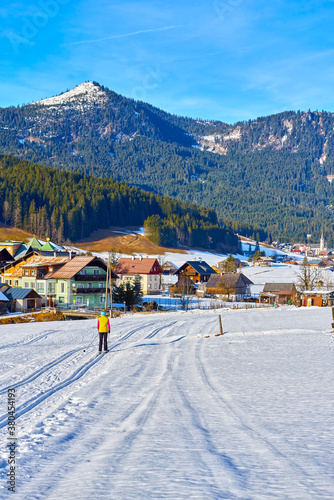 elderly skier on the track