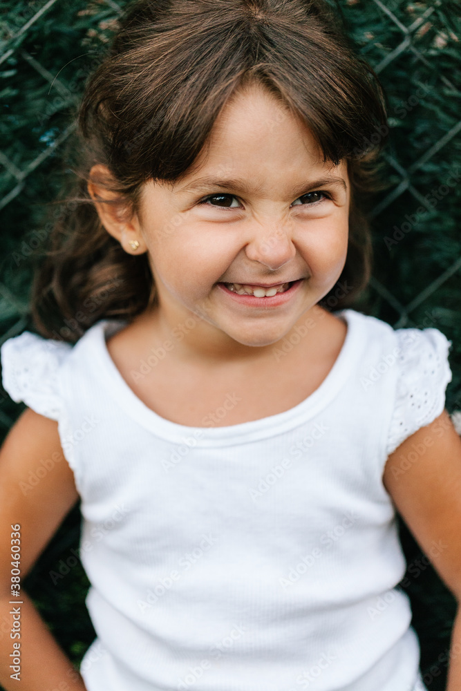 Portrait of a Funny Little Girl Laughing Portrait of a Funny Little Girl Laughing