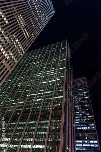 kycrapers and towers in manhattan skyline view at night photo