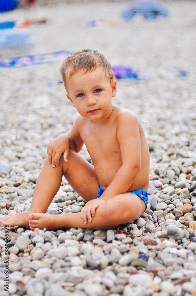Boy is playing with the stones Boy is playing with the stones