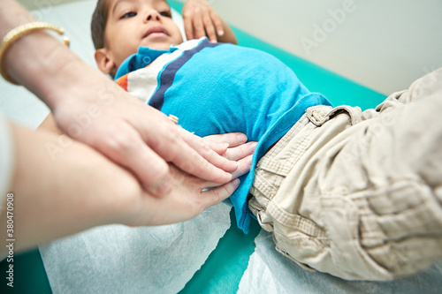 A little boy being examined by a doctor