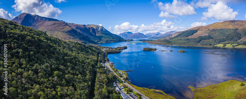 aerial view of loch linnhe in summer near duror and ballachulish and glencoe in the argyll region of the highlands of scotland showing blue water and green fertile coast line photo