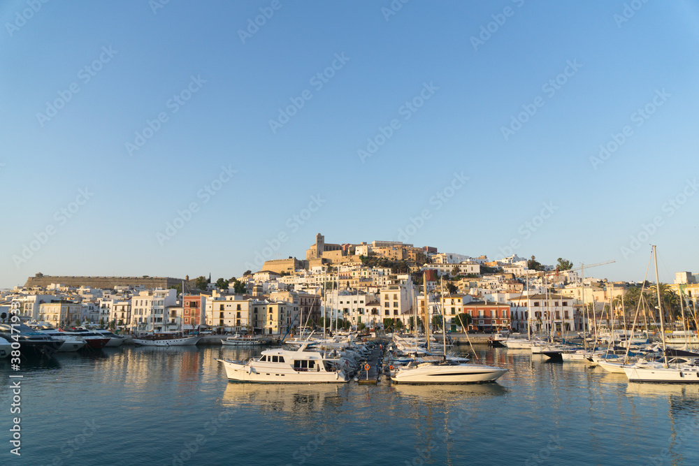 View of a beautiful sunrise in the harbor of Ibiza View of a beautiful sunrise in the harbor of Ibiza