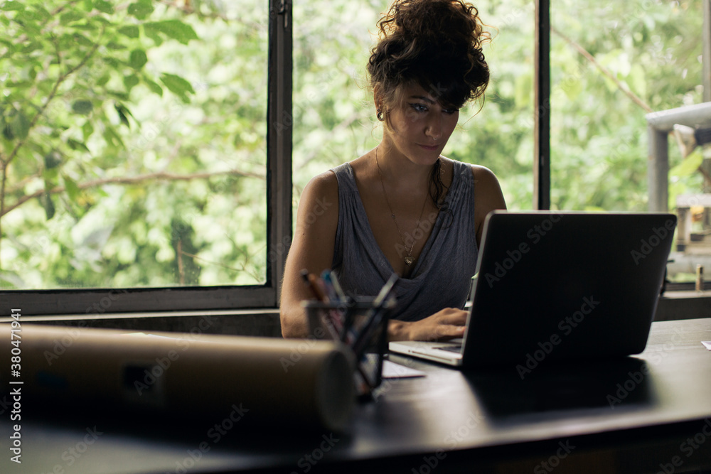 Woman Working on Laptop