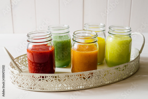 Fruit smoothies in jars photo