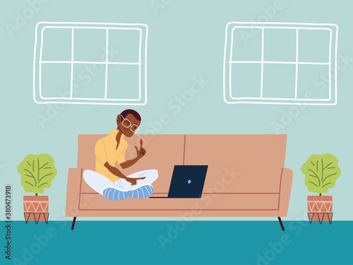 man working remotely from her home