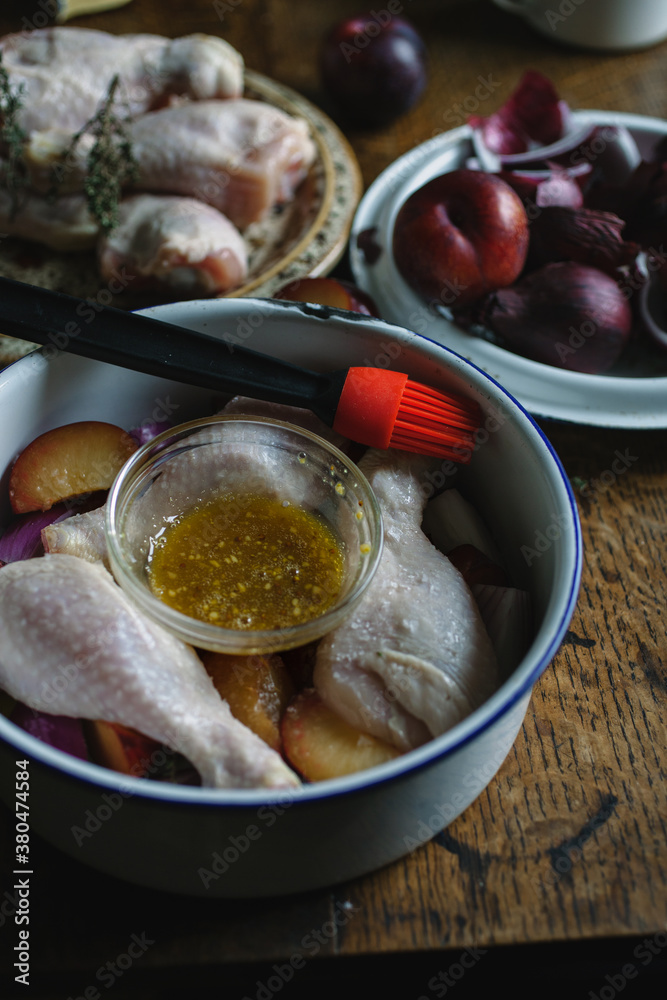 Preparing a chicken meal, ready to apply the glaze to the chicken. Preparing a chicken meal, ready to apply the glaze to the chicken.