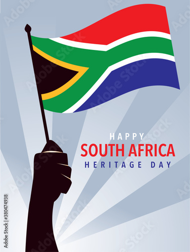 happy South African heritage day, hands holding flag of South Africa