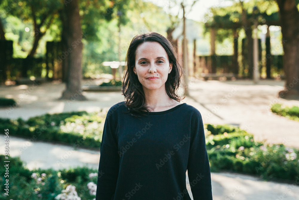Pretty brunette in a park Pretty brunette in a park