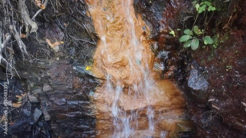 Waterfall in forest. Peñalaba de Santiago. Leon,Spain photo