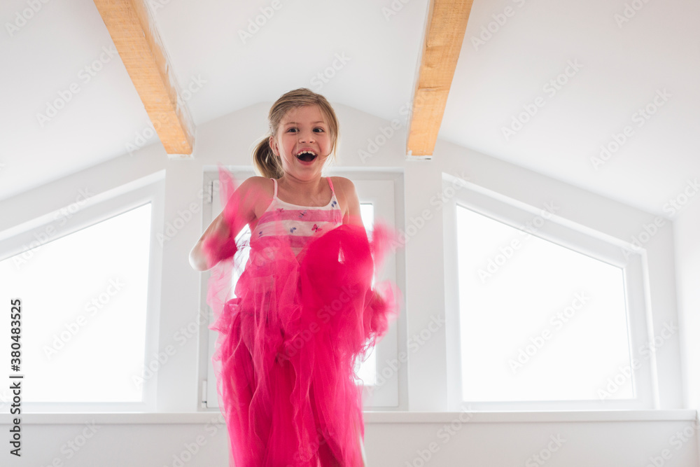 Girl in a Pink Skirt Jumping on Bed Girl in a Pink Skirt Jumping on Bed