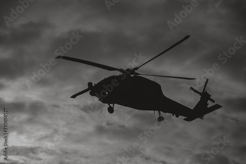 Military helicopter in flight.