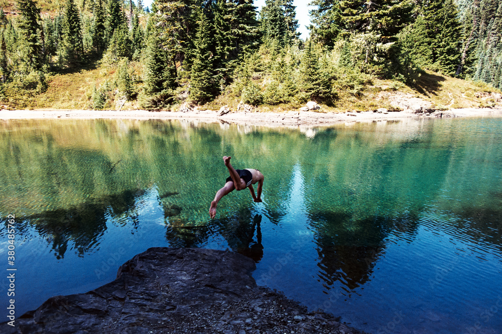 Man Dives Into Mountain Lake on 35mm