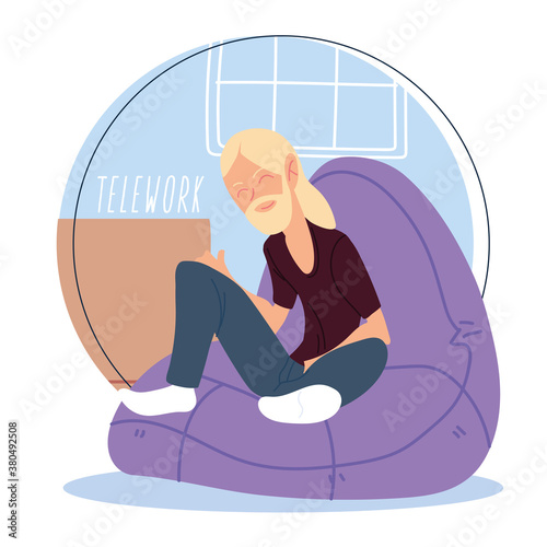 man working remotely from her home