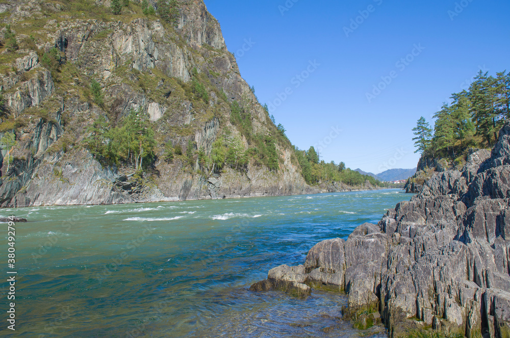 The Chuya River among mountains in Mountain Altai of Russia a beautiful landscape
