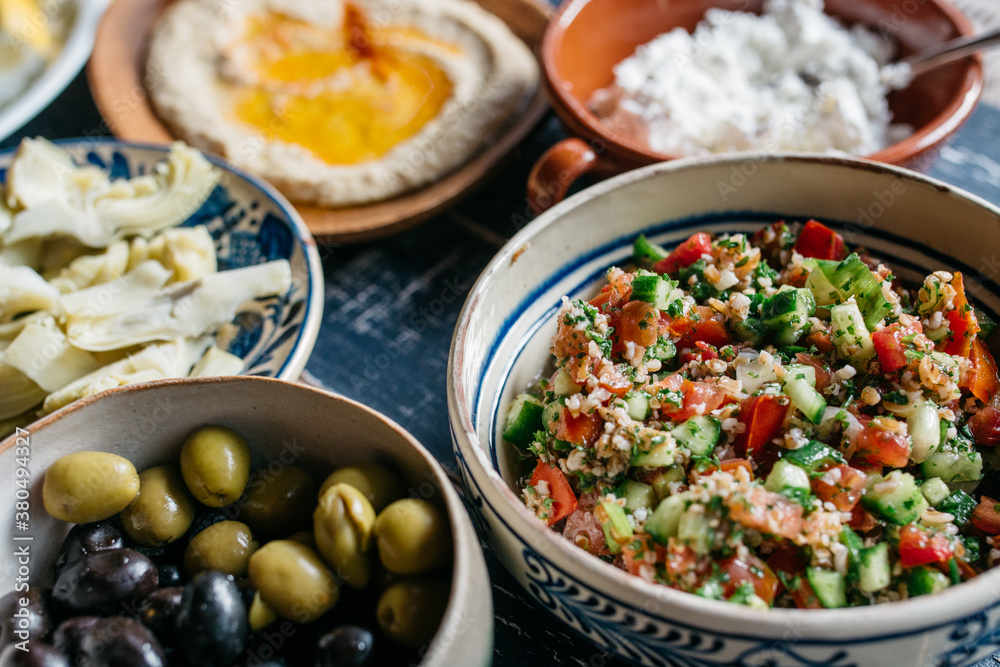 Tabouleh, olives, hummus and artichokes Tabouleh, olives, hummus and artichokes