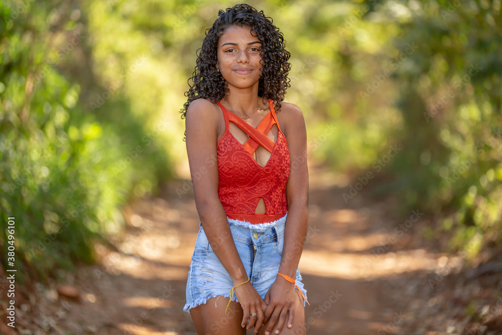 portrait of young woman smiling portrait of young woman smiling