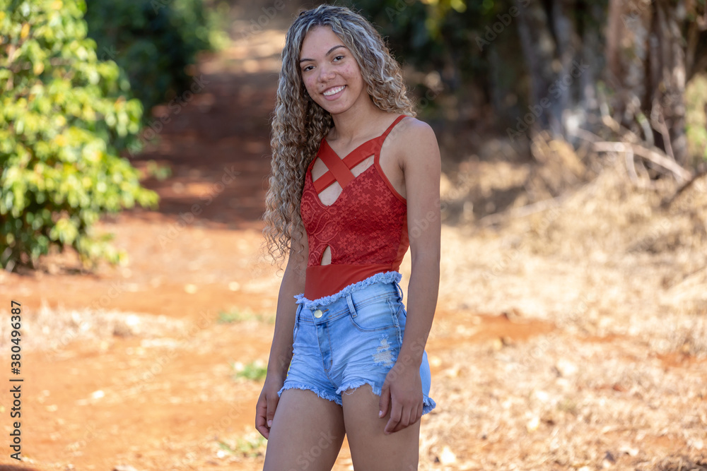 portrait of young woman smiling portrait of young woman smiling
