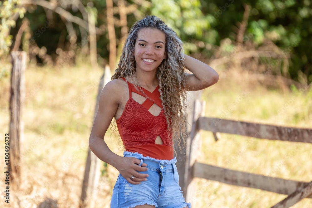 portrait of young woman smiling portrait of young woman smiling