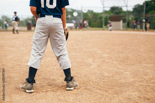 behind the shortstop during a baseball game