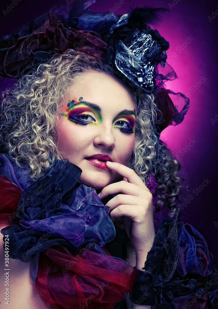 Beautiful woman with artistic make-up.