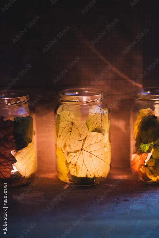 Candles in a leaf jar Candles in a leaf jar